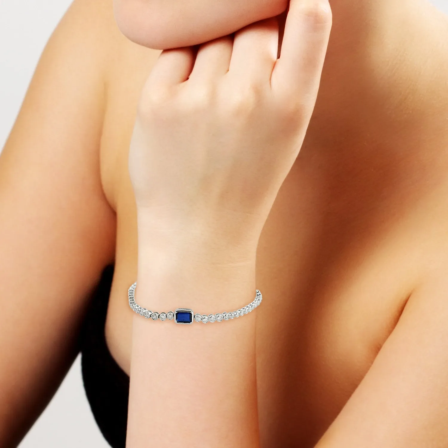 Blue Sapphire Bezel Set Diamond Fixed And Flexible Bracelet In White Gold